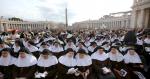 Canonizing four saints, pope urges people 