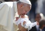 Share hope with those seeking better lives, pope says