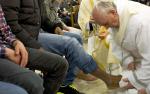 Pope washes feet of 12 young detainees to serve them 'from the heart' 