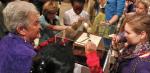 At national shrine, hundreds venerate St. Therese's writing desk