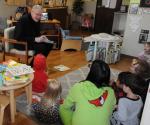 Bishop reads to kids at St. Vincent during 5th Annual Literacy Week